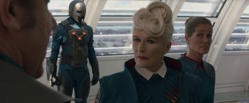 Movie still from “Guardians of the Galaxy” (2014), directed by James Gunn – A woman in a futuristic outfit and a man in a space suit; Medium shot, Over the shoulder angle