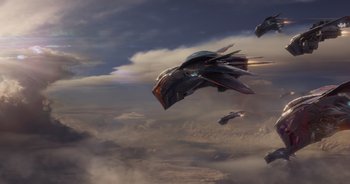 Movie still from “Guardians of the Galaxy” (2014), directed by James Gunn – A bunch of jets are flying in the sky; Extreme Wide shot, Low angle