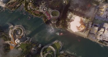 Movie still from “Guardians of the Galaxy” (2014), directed by James Gunn – An aerial view of a city with a river and buildings; Extreme Wide shot, Overhead angle