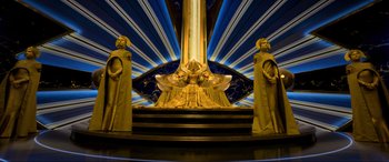 Movie still from “Guardians of the Galaxy Vol. 2” (2017), directed by James Gunn – A statue of a person sitting on top of a platform; Extreme Wide shot, Low angle