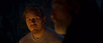 Movie still from “Guardians of the Galaxy Vol. 2” (2017), directed by James Gunn – A man looking at the camera while another man looks at him; Close Up shot, Over the shoulder angle