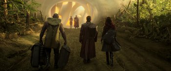 Movie still from “Guardians of the Galaxy Vol. 2” (2017), directed by James Gunn – A group of people standing in front of a tunnel; Wide shot, Low angle