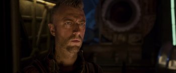 Movie still from “Guardians of the Galaxy Vol. 2” (2017), directed by James Gunn – A person with a beard; Close Up shot, Over the shoulder angle