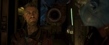 Movie still from “Guardians of the Galaxy Vol. 2” (2017), directed by James Gunn – A person in a room with lights on; Close Up shot, Over the shoulder angle