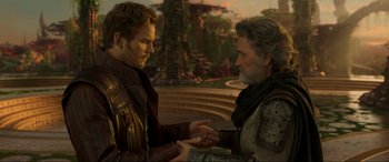 Movie still from “Guardians of the Galaxy Vol. 2” (2017), directed by James Gunn – Two people are holding hands in a scene from guardians of the galaxy vol; Close Up shot, Over the shoulder angle