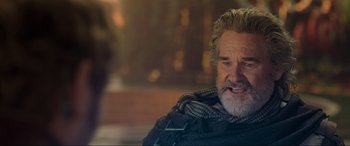 Movie still from “Guardians of the Galaxy Vol. 2” (2017), directed by James Gunn – An older man wearing a scarf and a jacket; Close Up shot, Over the shoulder angle