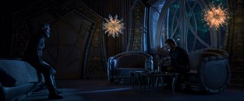 Movie still from “Guardians of the Galaxy Vol. 2” (2017), directed by James Gunn – A woman sitting on a chair in a living room; Wide shot, High angle
