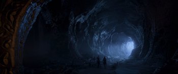 Movie still from “Guardians of the Galaxy Vol. 2” (2017), directed by James Gunn – Two people are standing in a dark cave; Extreme Wide shot, High angle