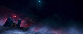 Movie still from “Guardians of the Galaxy Vol. 2” (2017), directed by James Gunn – A night sky with stars and nebula in the background; Extreme Wide shot, Low angle