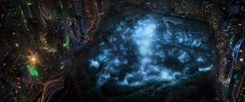 Movie still from “Guardians of the Galaxy Vol. 2” (2017), directed by James Gunn – An aerial view of a city at night with clouds; Extreme Wide shot, High angle