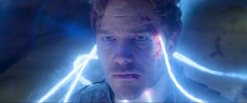 Movie still from “Guardians of the Galaxy Vol. 2” (2017), directed by James Gunn – A man with blood on his face; Close Up shot, Over the shoulder angle