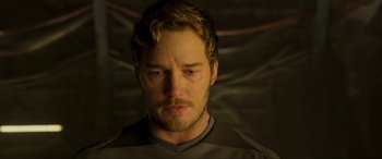 Movie still from “Guardians of the Galaxy Vol. 2” (2017), directed by James Gunn – A person with a beard; Close Up shot, Over the shoulder angle