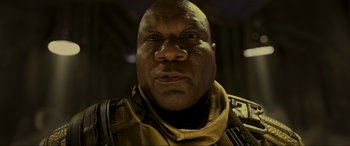 Movie still from “Guardians of the Galaxy Vol. 2” (2017), directed by James Gunn – A person wearing a uniform; Close Up shot, Low angle