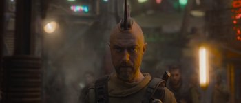 Movie still from “Guardians of the Galaxy Vol. 3” (2023), directed by James Gunn – A person with a mohawk; Close Up shot, Over the shoulder angle