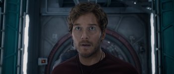 Movie still from “Guardians of the Galaxy Vol. 3” (2023), directed by James Gunn – A person with a beard; Close Up shot, Over the shoulder angle