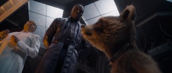 Movie still from “Guardians of the Galaxy Vol. 3” (2023), directed by James Gunn – A man and a dog are looking at one another; Medium shot, Over the shoulder angle