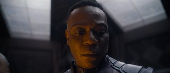 Movie still from “Guardians of the Galaxy Vol. 3” (2023), directed by James Gunn – A person wearing a suit; Close Up shot, Low angle