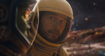 Movie still from “Guardians of the Galaxy Vol. 3” (2023), directed by James Gunn – A person wearing a space suit; Close Up shot, Over the shoulder angle