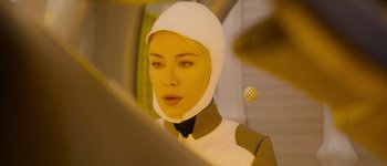 Movie still from “Guardians of the Galaxy Vol. 3” (2023), directed by James Gunn – A woman in a white suit and a white hat; Close Up shot, Over the shoulder angle