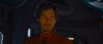 Movie still from “Guardians of the Galaxy Vol. 3” (2023), directed by James Gunn – A person wearing a red shirt; Close Up shot, Over the shoulder angle
