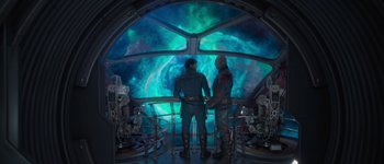 Movie still from “Guardians of the Galaxy Vol. 3” (2023), directed by James Gunn – Two people standing in front of a large window; Medium shot, Over the shoulder angle
