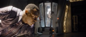 Movie still from “Guardians of the Galaxy Vol. 3” (2023), directed by James Gunn – A man's face in front of an elevator; Close Up shot, Over the shoulder angle