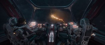 Movie still from “Guardians of the Galaxy Vol. 3” (2023), directed by James Gunn – A view of a space ship from the cockpit; Extreme Wide shot, Overhead angle