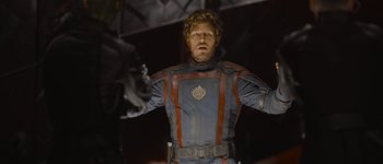 Movie still from “Guardians of the Galaxy Vol. 3” (2023), directed by James Gunn – A person wearing a costume; Medium shot, Over the shoulder angle