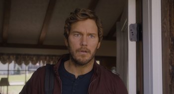 Movie still from “Guardians of the Galaxy Vol. 3” (2023), directed by James Gunn – A person wearing a jacket; Close Up shot, Over the shoulder angle