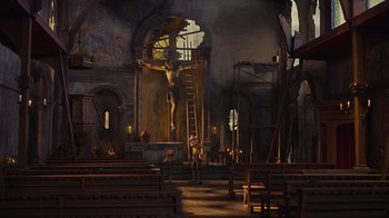 Movie still from “Guillermo del Toro's Pinocchio” (2022), directed by Guillermo del Toro – A man standing in front of a crucifixion in a church; Extreme Wide shot, Low angle