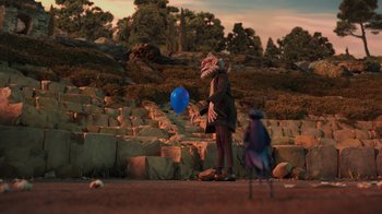 Movie still from “Guillermo del Toro's Pinocchio” (2022), directed by Guillermo del Toro – An image of a man playing with a blue balloon; Extreme Wide shot, High angle