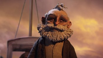 Movie still from “Guillermo del Toro's Pinocchio” (2022), directed by Guillermo del Toro – The head of an old man; Close Up shot, Low angle