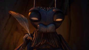 Movie still from “Guillermo del Toro's Pinocchio” (2022), directed by Guillermo del Toro – An ant holding a feather in its hand; Extreme Close Up shot, High angle
