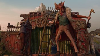 Movie still from “Guillermo del Toro's Pinocchio” (2022), directed by Guillermo del Toro – A man that is dressed like a wolf; Wide shot, Low angle