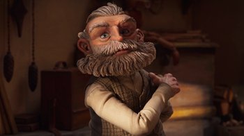 Movie still from “Guillermo del Toro's Pinocchio” (2022), directed by Guillermo del Toro – A man with a long beard and a mustache; Close Up shot, Low angle