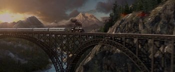 Movie still from “Hacksaw Ridge” (2016), directed by Mel Gibson – A train traveling over a bridge near a mountain; Extreme Wide shot, High angle
