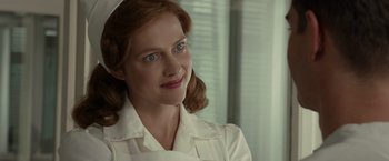 Movie still from “Hacksaw Ridge” (2016), directed by Mel Gibson – A person wearing a white shirt; Close Up shot, Over the shoulder angle