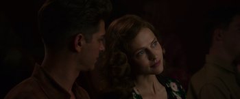 Movie still from “Hacksaw Ridge” (2016), directed by Mel Gibson – A man and a woman looking at one another; Close Up shot, Over the shoulder angle