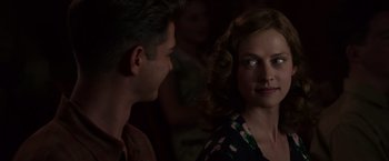 Movie still from “Hacksaw Ridge” (2016), directed by Mel Gibson – A man and a woman looking at one another; Close Up shot, Over the shoulder angle