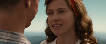 Movie still from “Hacksaw Ridge” (2016), directed by Mel Gibson – A woman's face with a headband; Close Up shot, Over the shoulder angle