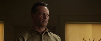 Movie still from “Hacksaw Ridge” (2016), directed by Mel Gibson – A person wearing a brown shirt; Close Up shot, Low angle