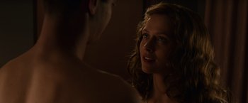 Movie still from “Hacksaw Ridge” (2016), directed by Mel Gibson – A man and a woman looking at one another in a mirror; Close Up shot, Over the shoulder angle