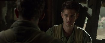 Movie still from “Hacksaw Ridge” (2016), directed by Mel Gibson – A man looking at himself in the mirror; Close Up shot, Over the shoulder angle