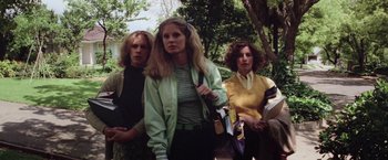 Movie still from “Halloween” (1978), directed by John Carpenter – A group of women standing next to each other; Medium shot, Low angle