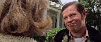 Movie still from “Halloween” (1978), directed by John Carpenter – A man and a woman's hair; Close Up shot, Low angle