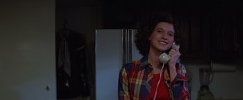 Movie still from “Halloween” (1978), directed by John Carpenter – A woman holding a phone up to her ear; Close Up shot, Low angle