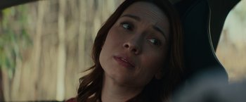 Movie still from “Halloween” (2018), directed by David Gordon Green – A person looking at the camera; Close Up shot, Over the shoulder angle