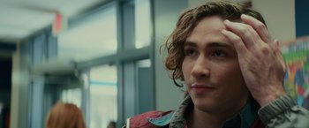 Movie still from “Halloween” (2018), directed by David Gordon Green – A person with long hair; Close Up shot, Over the shoulder angle