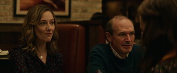 Movie still from “Halloween” (2018), directed by David Gordon Green – A man and a woman sitting at a table in a restaurant; Medium shot, Over the shoulder angle