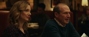 Movie still from “Halloween” (2018), directed by David Gordon Green – A man and a woman sitting at a table in a restaurant; Close Up shot, Over the shoulder angle